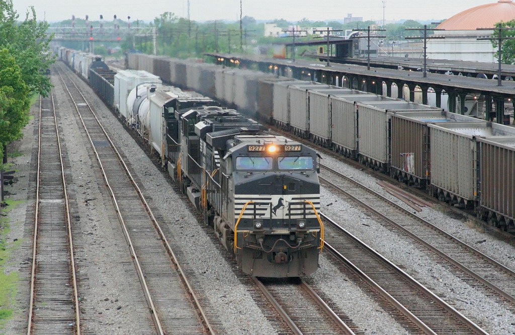NS NB freight with CSX SB coal train waiting at 13 th st